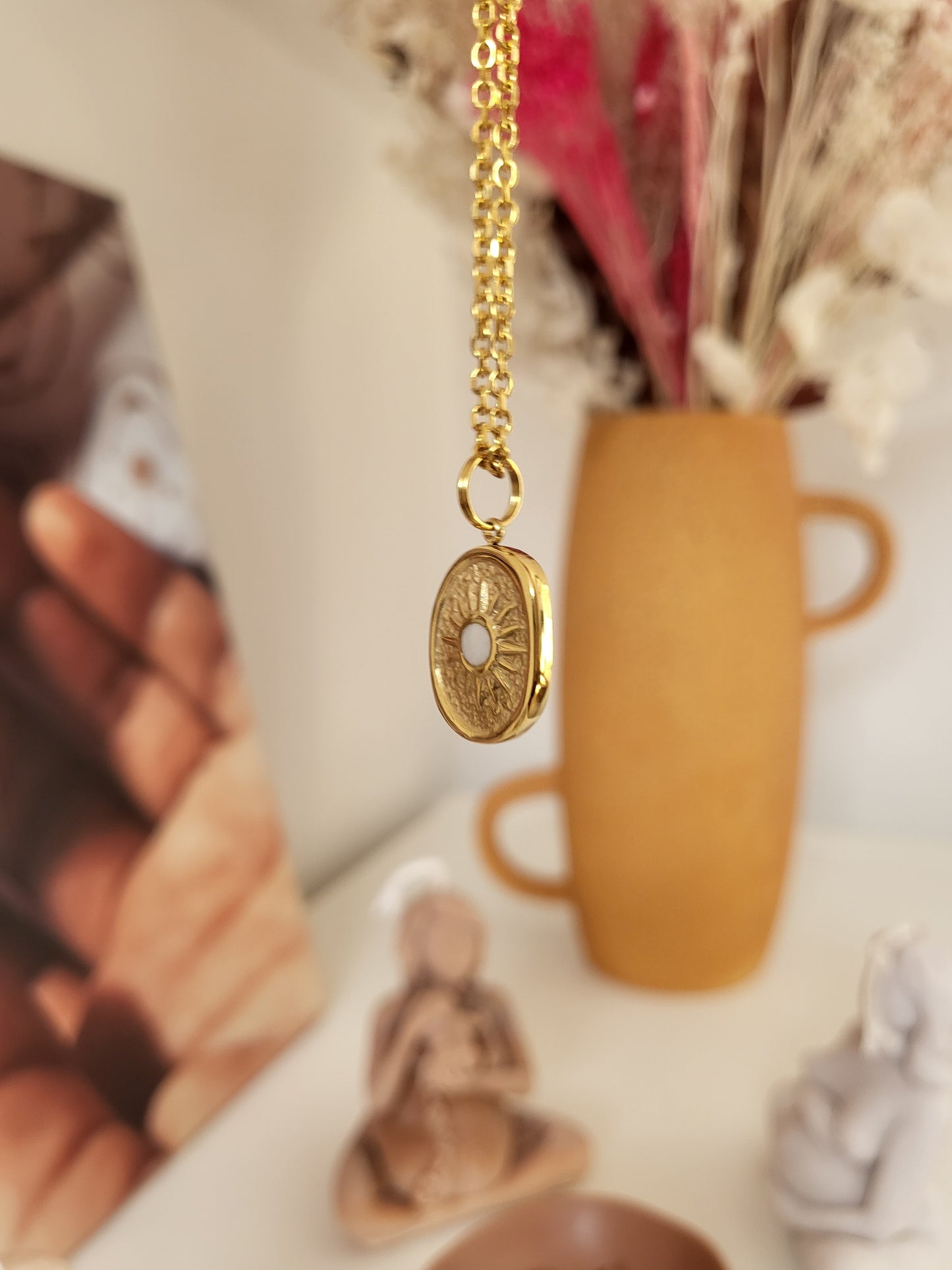 Collier médaille soleil