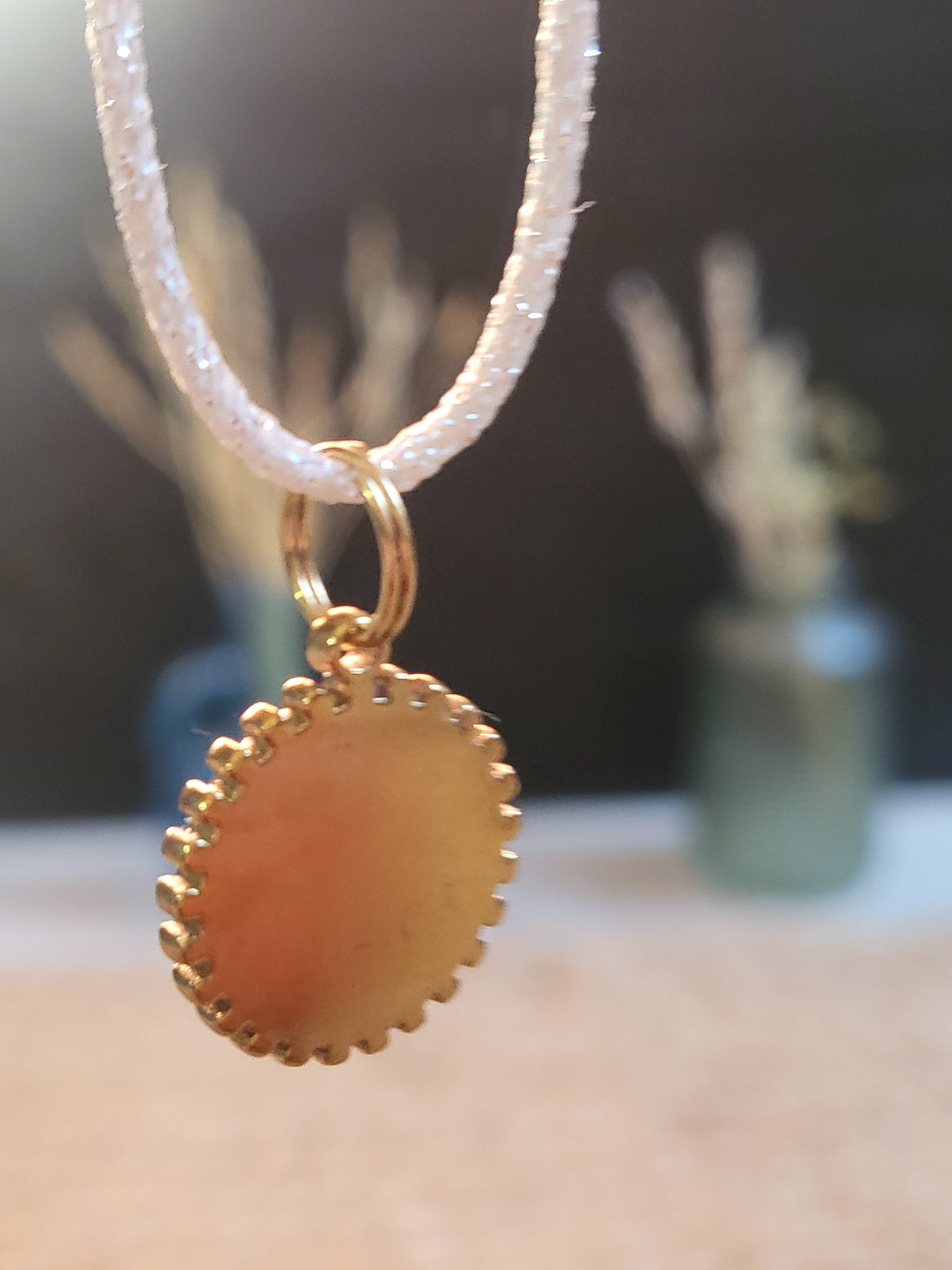 Pendentif Soleil Étoilé Mokuba