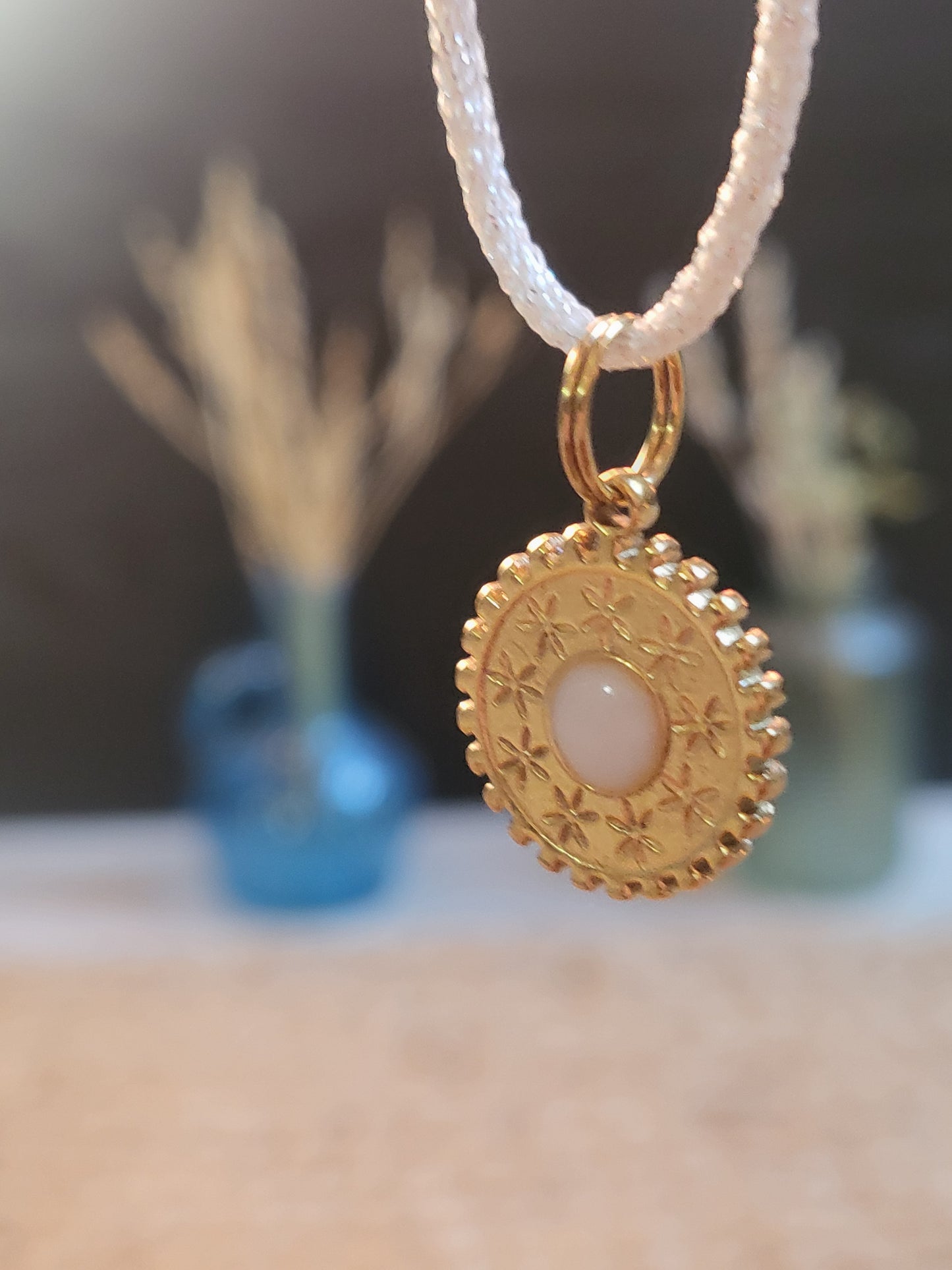 Pendentif Soleil Étoilé Mokuba