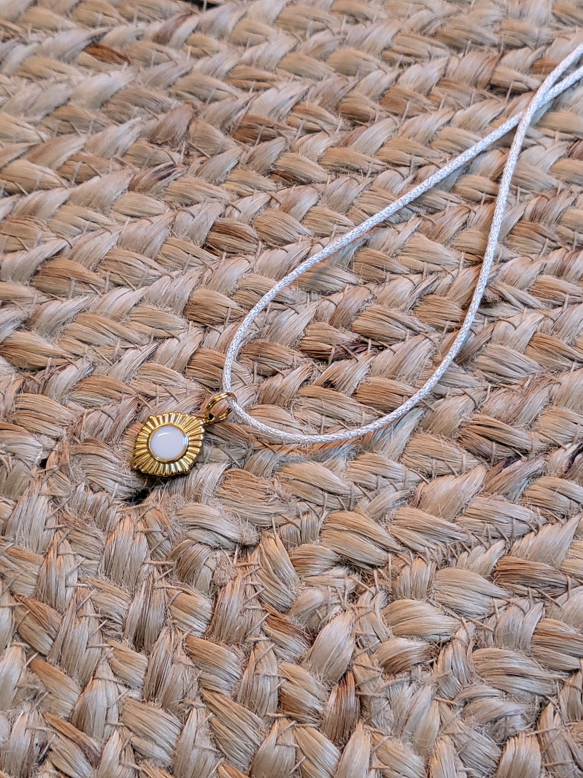Pendentif Soleil Mokuba