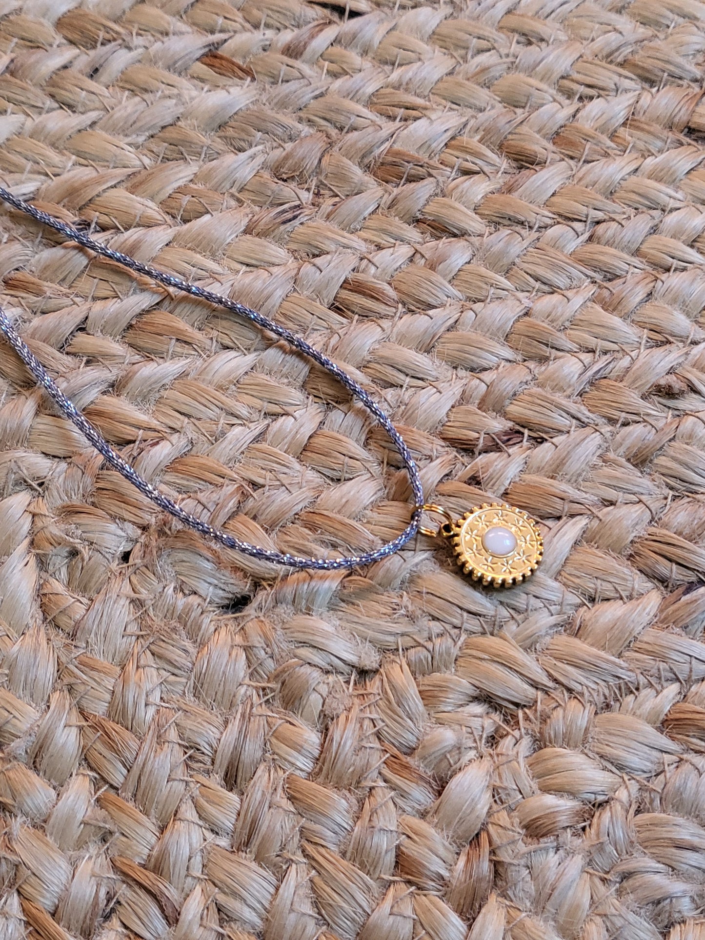 Pendentif Soleil Étoilé Mokuba